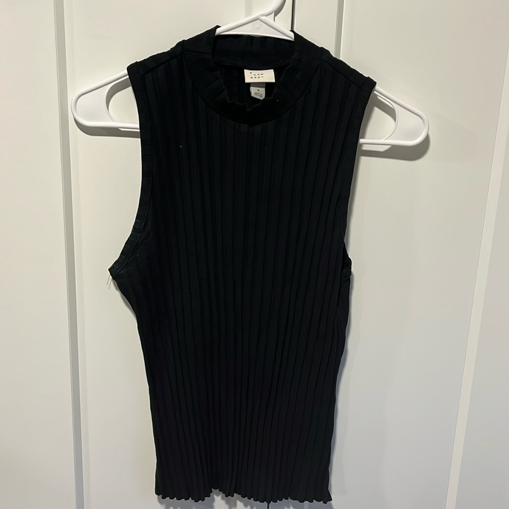 cute, high neck line, sleeveless shirt